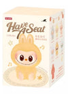 POP MART: THE MONSTERS Have A Seat Vinyl Face - 1 Blind Box