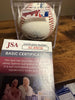JSA certificate and matching baseball sticker AC49650