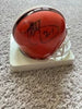 Eric Metcalf signature on orange mini helmet